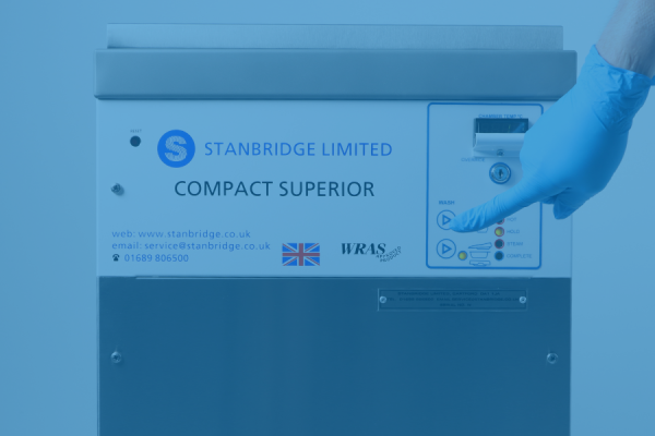 Hand selecting a wash ons tanbirdge bedpan washer